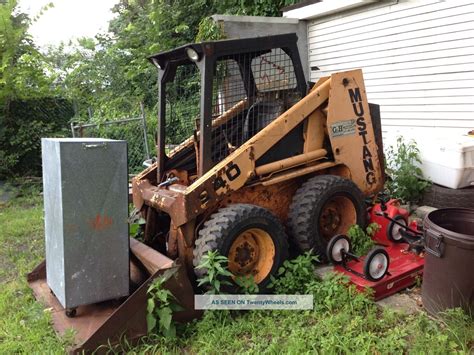 mustang skid steer bucket lever action|Mustang 940E hydraulic problem .